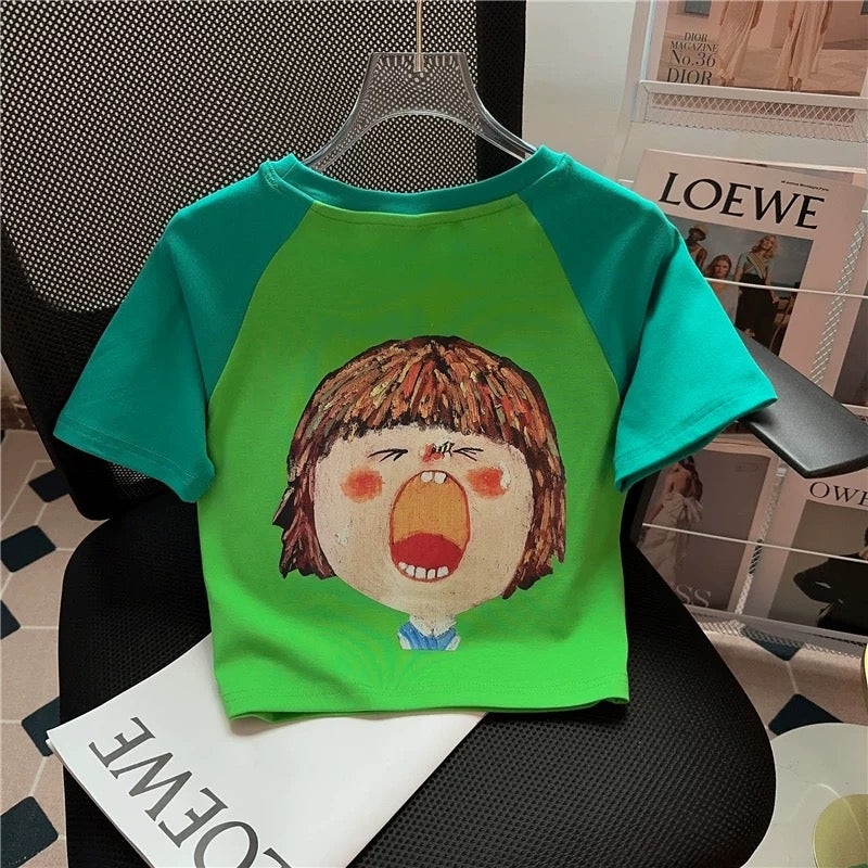 T-ShirtGreen Graphic Tee – Cartoon Yawning Girl Print