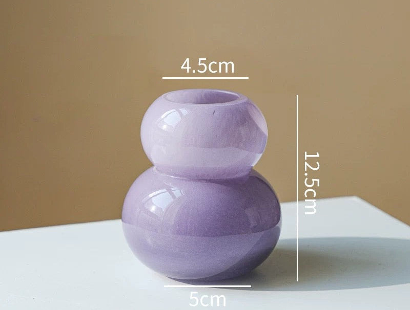 Purple vase with dimensions on a beige background, featuring the brand 'Siwa Studios'.