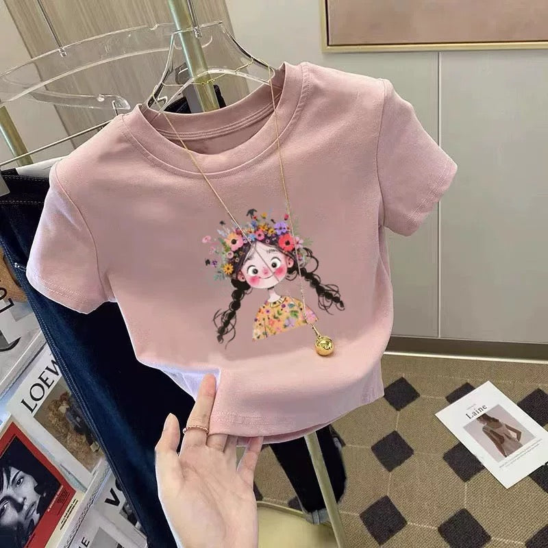 Pink t-shirt with a graphic design on a hanger