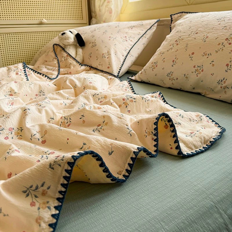 Vintage Yellow Floral Cotton Quilt with Navy Embroidered Trim