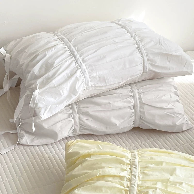 Ruffled Cotton Pillowcases with Side Ties in White and Lemon