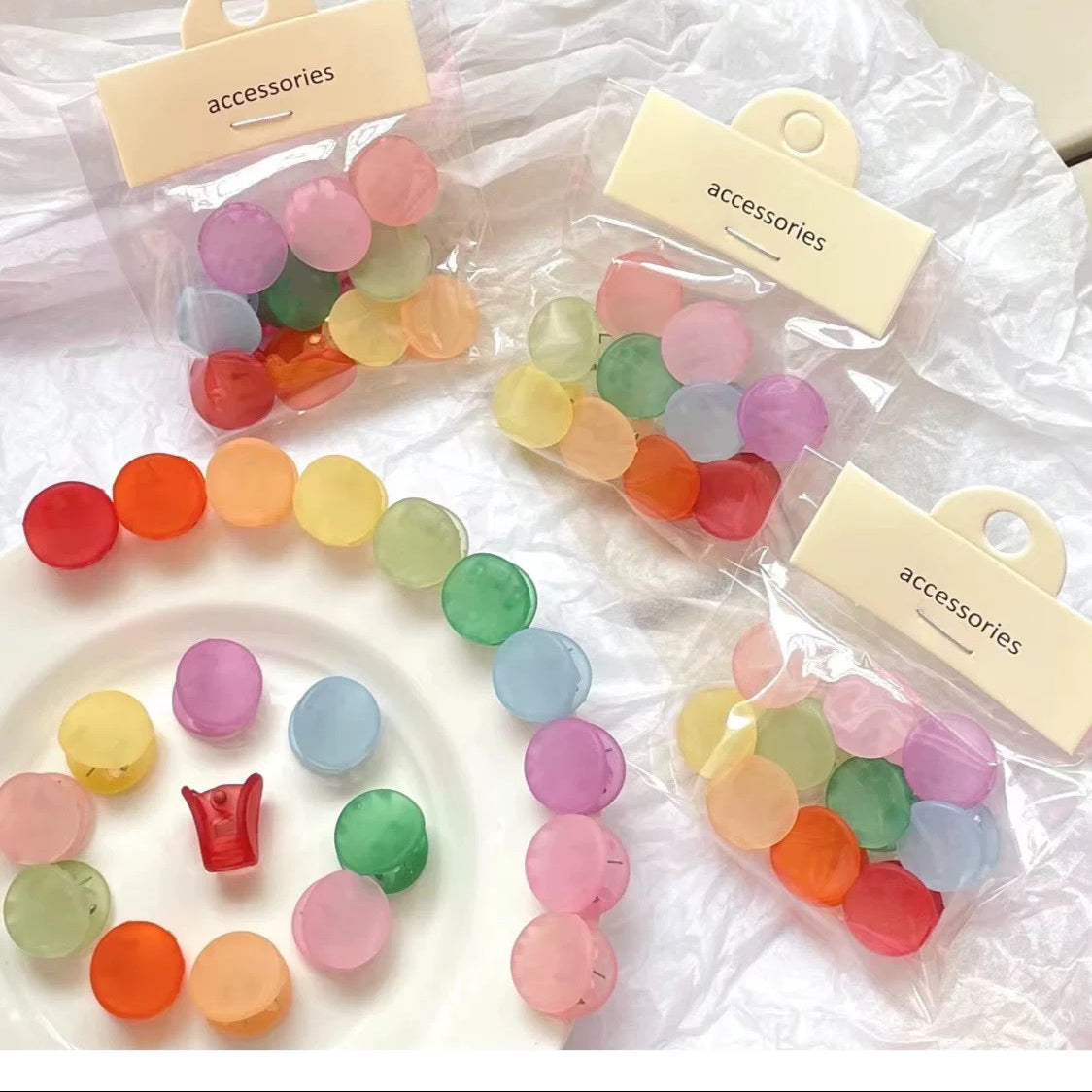 Colorful round accessories on a white background with 'accessories' labels.
