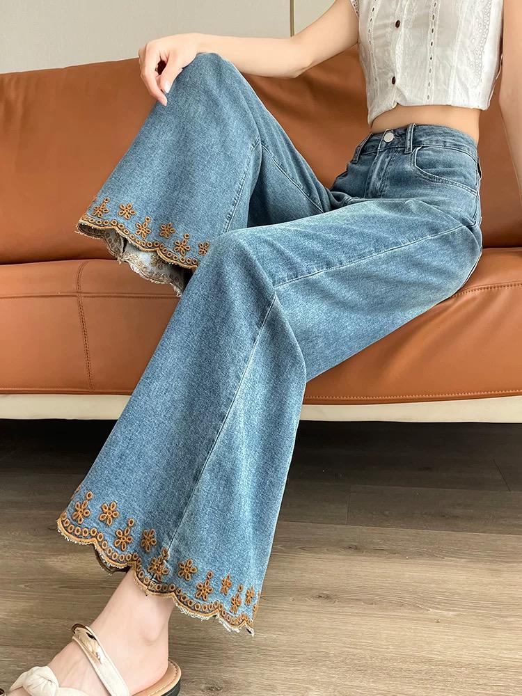 Blue Flared Jeans with Floral Embroidered Hem