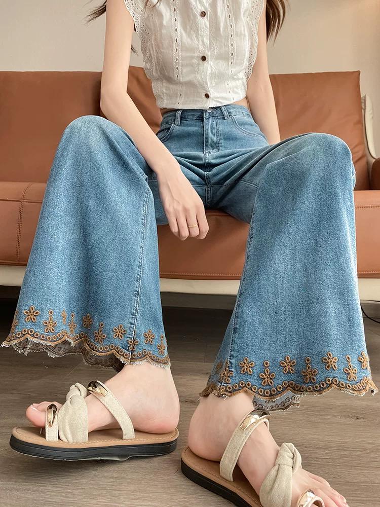 Blue Flared Jeans with Floral Embroidered Hem