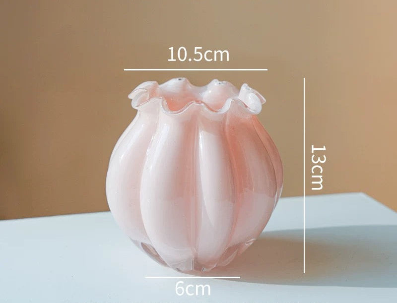 Pink glass vase with measurements on a beige background, featuring the brand 'Siwa Studios.