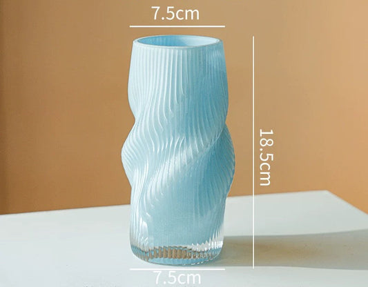 Blue textured vase with dimensions on a beige background, featuring the brand 'Siwa Studios.