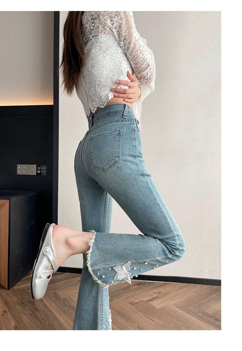 Light Blue Flare Jeans with Pearl and Butterfly Embellishments