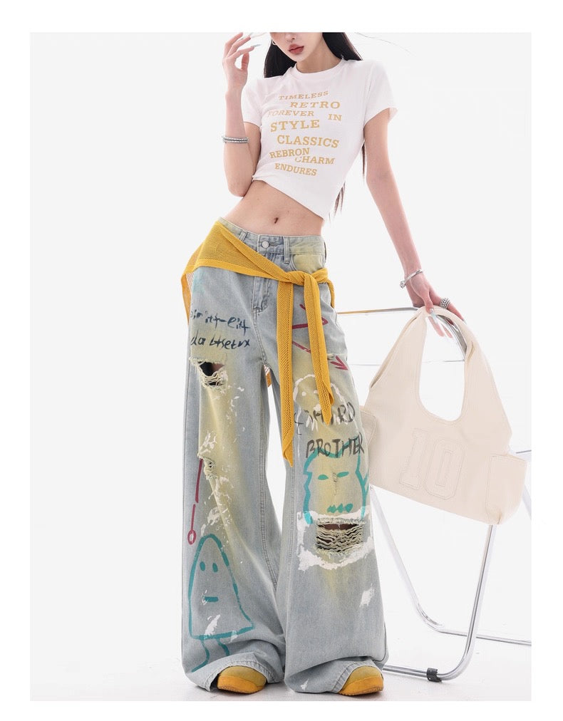 Grey Wide-Leg Jeans with Graffiti Art and Butterfly Patches