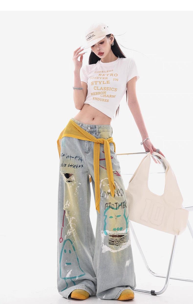 Grey Wide-Leg Jeans with Graffiti Art and Butterfly Patches