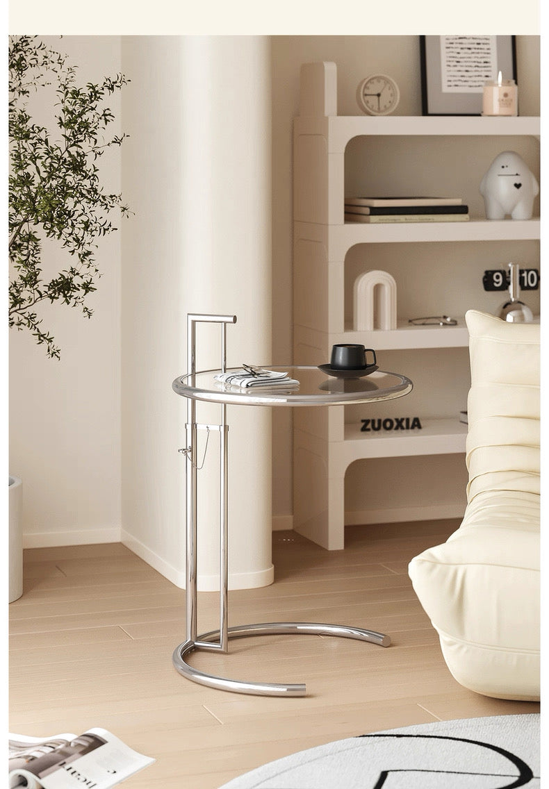 Modern side table with a sleek design in a minimalistic room.