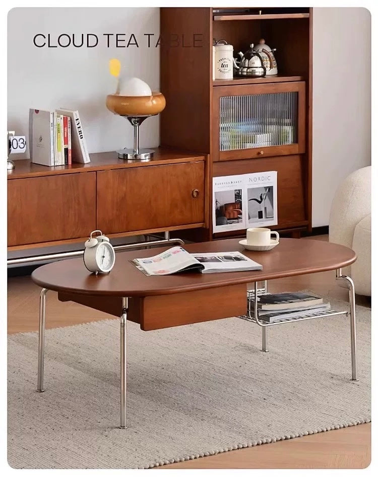 Wooden coffee table with metal legs in a living room setting