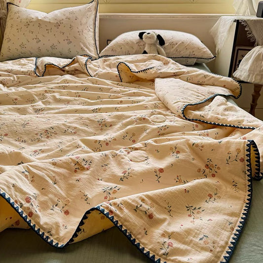 Vintage Yellow Floral Cotton Quilt with Navy Embroidered Trim