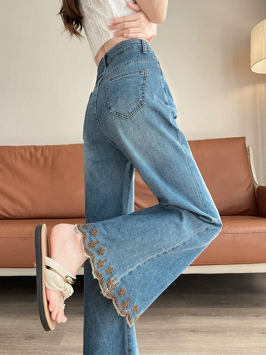 Blue Flared Jeans with Floral Embroidered Hem